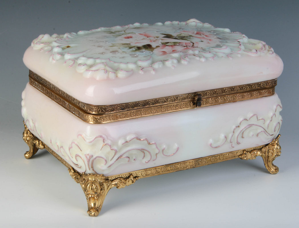 A LARGE 6 X 9 INCH WAVE CREST ORMOLU FOOTED BOX