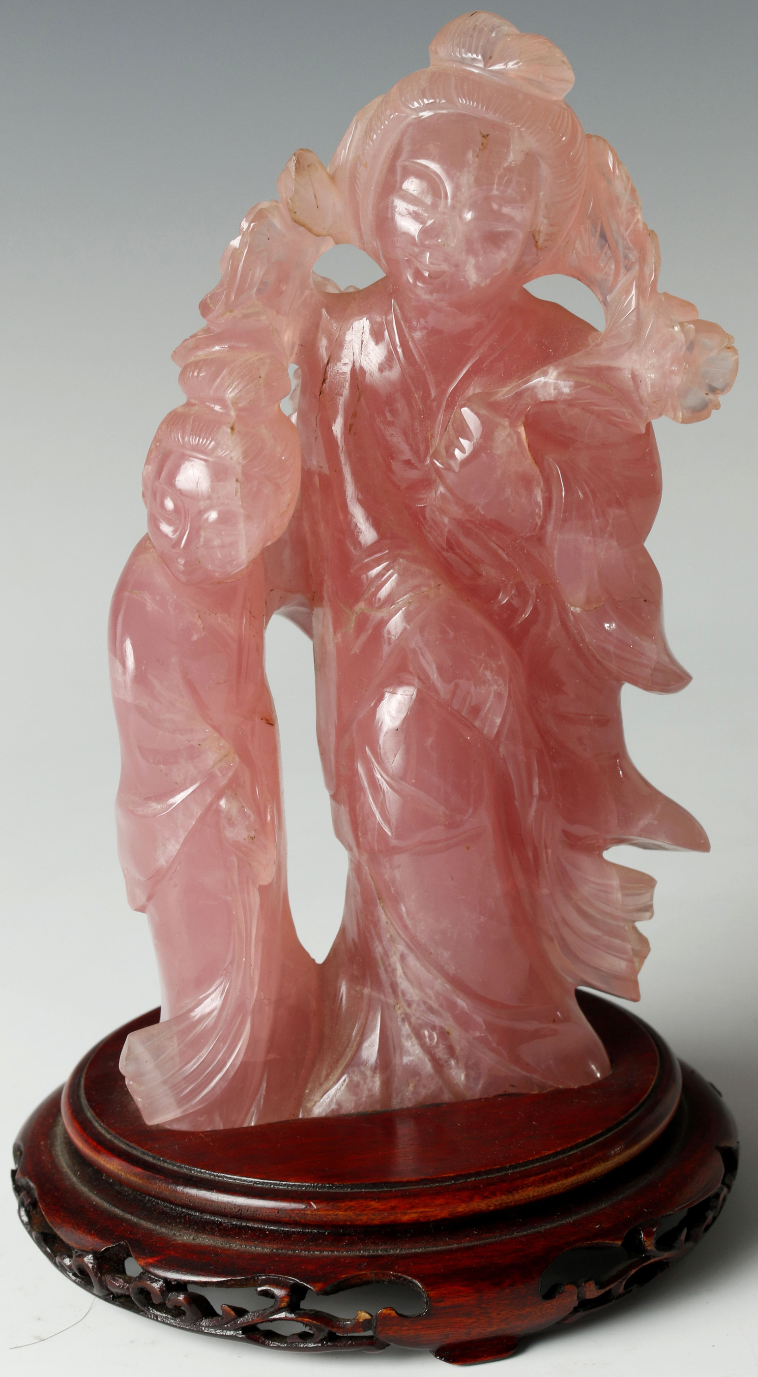 A CHINESE CARVED ROSE QUARTZ FIGURINE