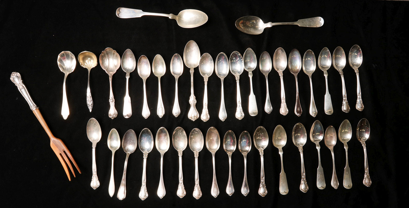 AN ESTATE LOT OF STERLING SPOONS