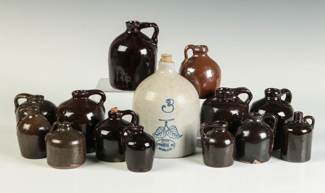 A COLLECTION OF MINIATURE STONEWARE JUGS