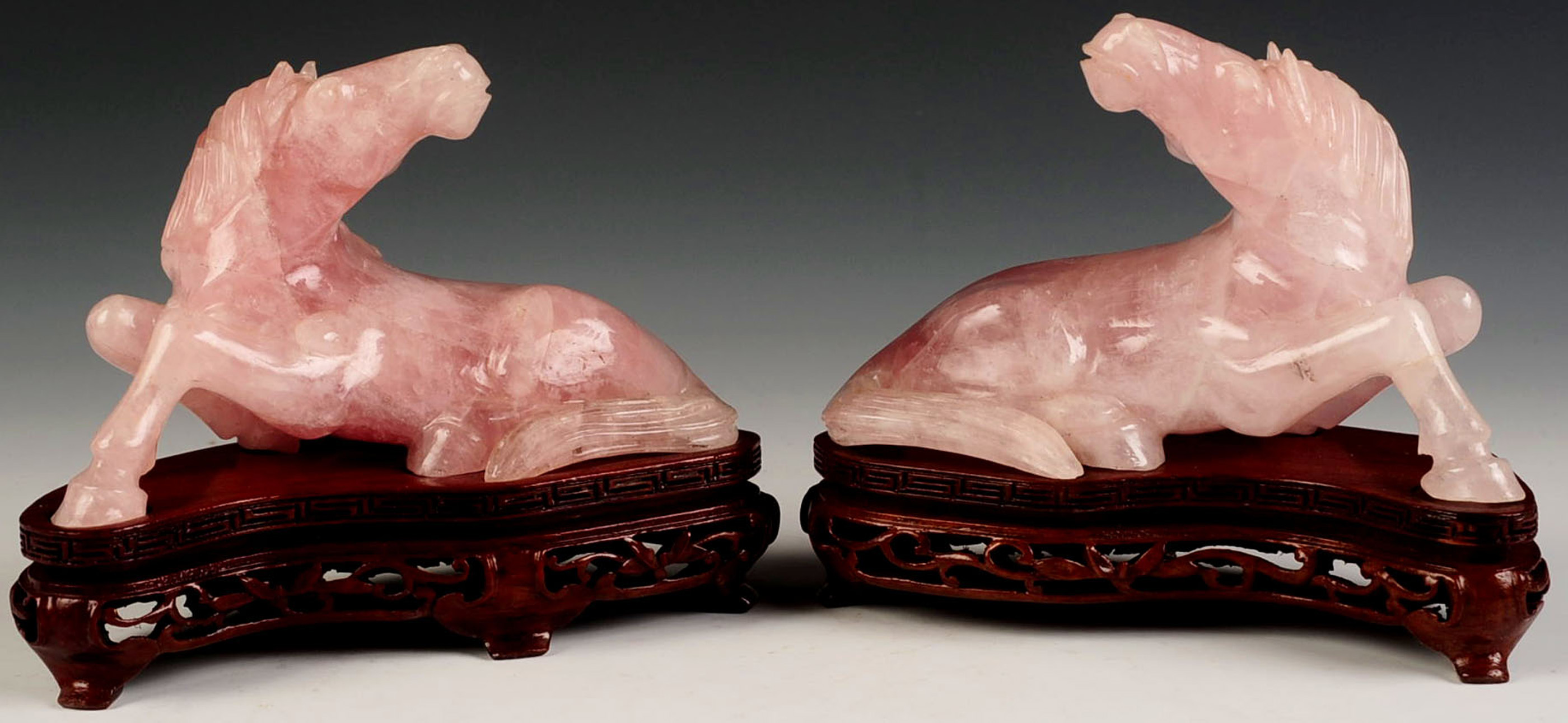 A PAIR CHINESE ROSE QUARTZ RECUMBENT HORSE FIGURES