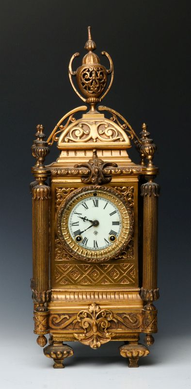 AN UNUSUAL ANSONIA ORNATELY CAST BRONZE CLOCK