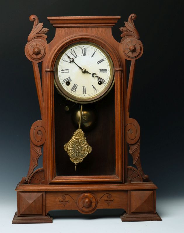 A VICTORIAN WALNUT PARLOR CLOCK ATTRIBUTED KROEBER