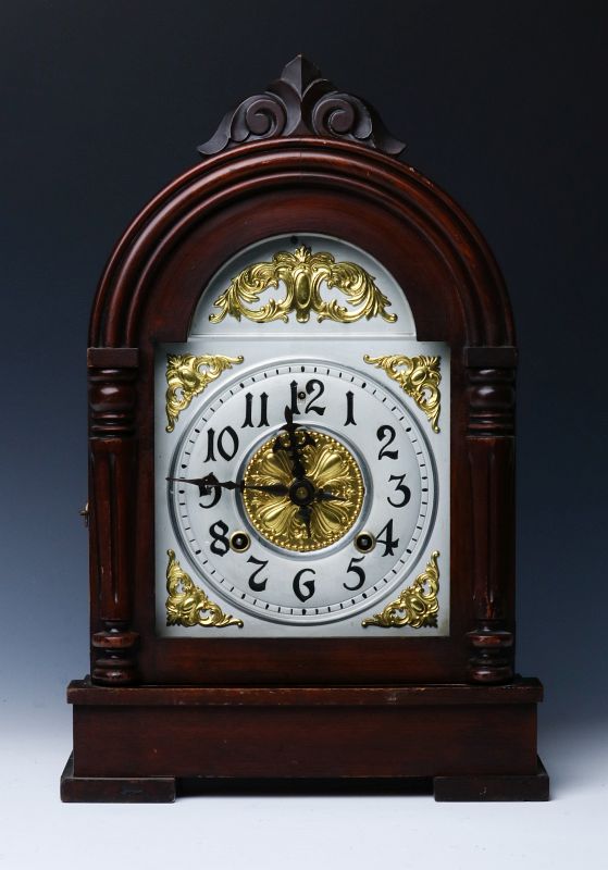 AN ANSONIA 'RIALTO' MAHOGANY STAIN BRACKET CLOCK