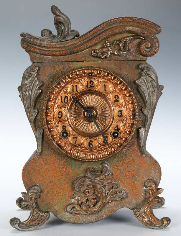 AN ANSONIA ORNATE ROCOCO STYLE IRON CLOCK