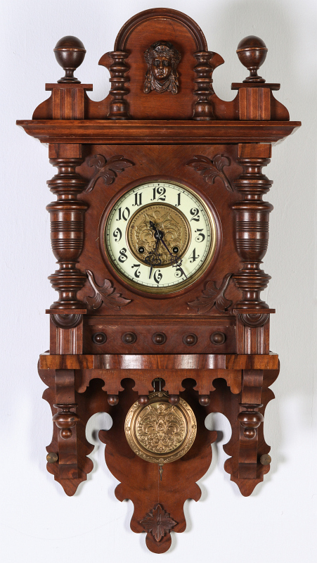 A GUSTAV BECKER OPEN WAG CLOCK WITH LADY'S HEAD