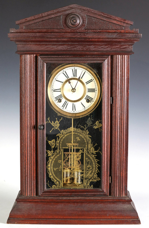 AN ANSONIA 'RINGOLD' WALNUT SHELF CLOCK