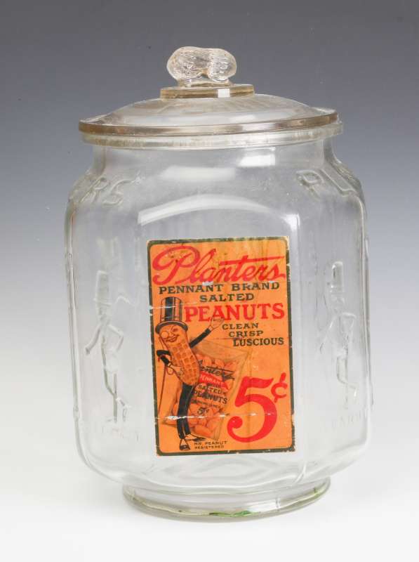 A PLANTER'S PEANUT JAR WITH 5 CENTS PAPER LABEL