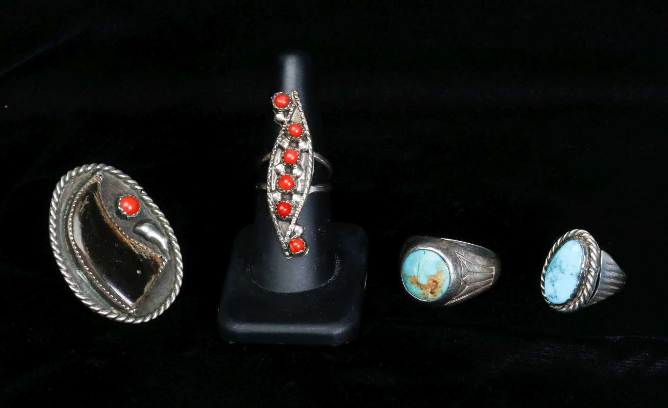 FOUR VINTAGE NAVAJO STERLING SILVER RINGS