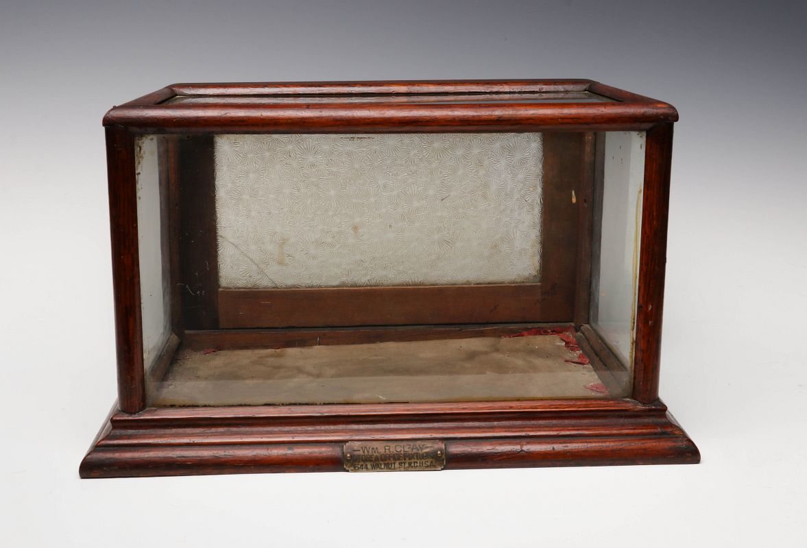 AN ANTIQUE COUNTERTOP SHOWCASE MADE IN KANSAS CITY