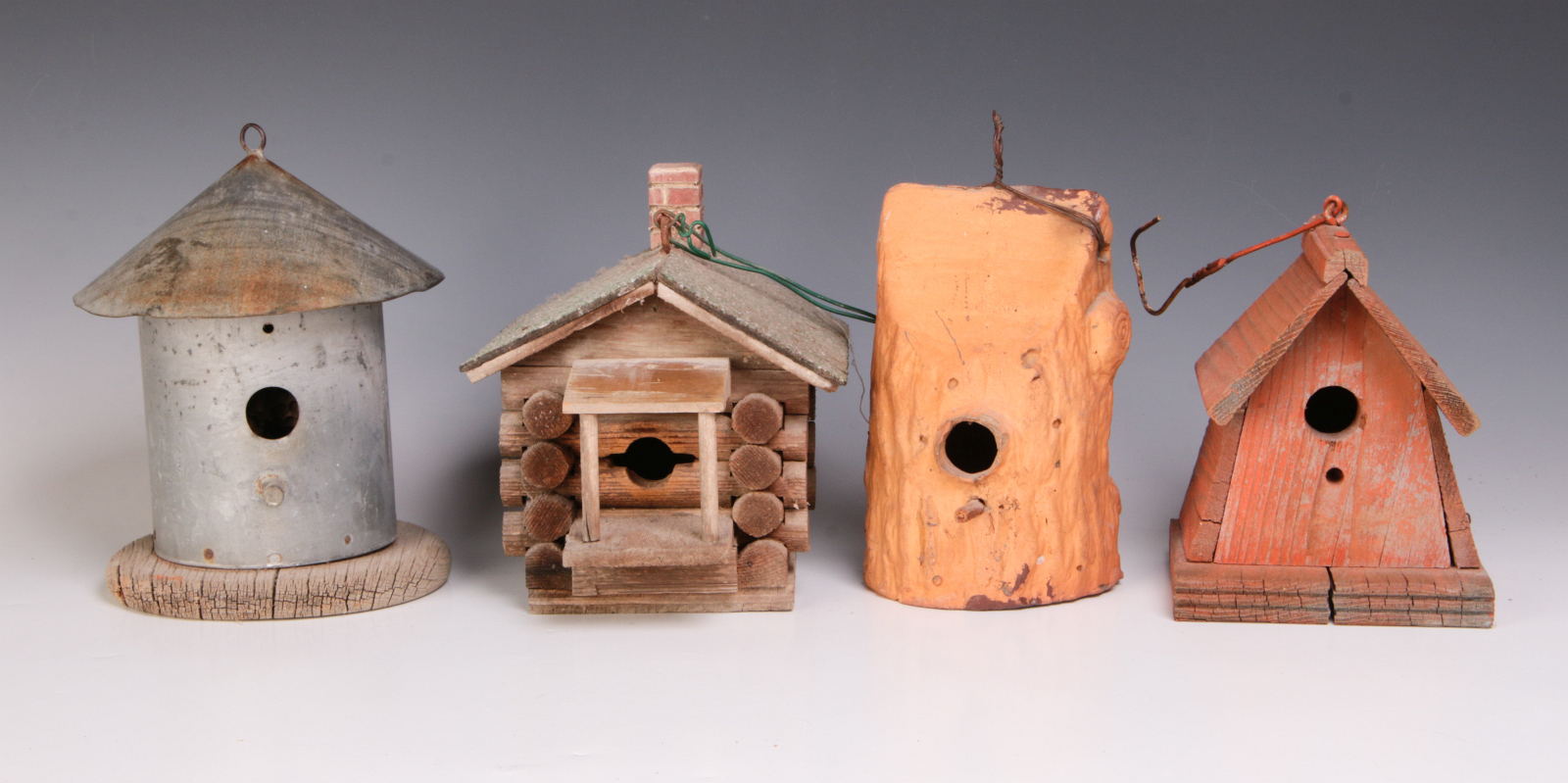 FOUR UNIQUE VINTAGE BIRD HOUSES OF VARIOUS TYPES