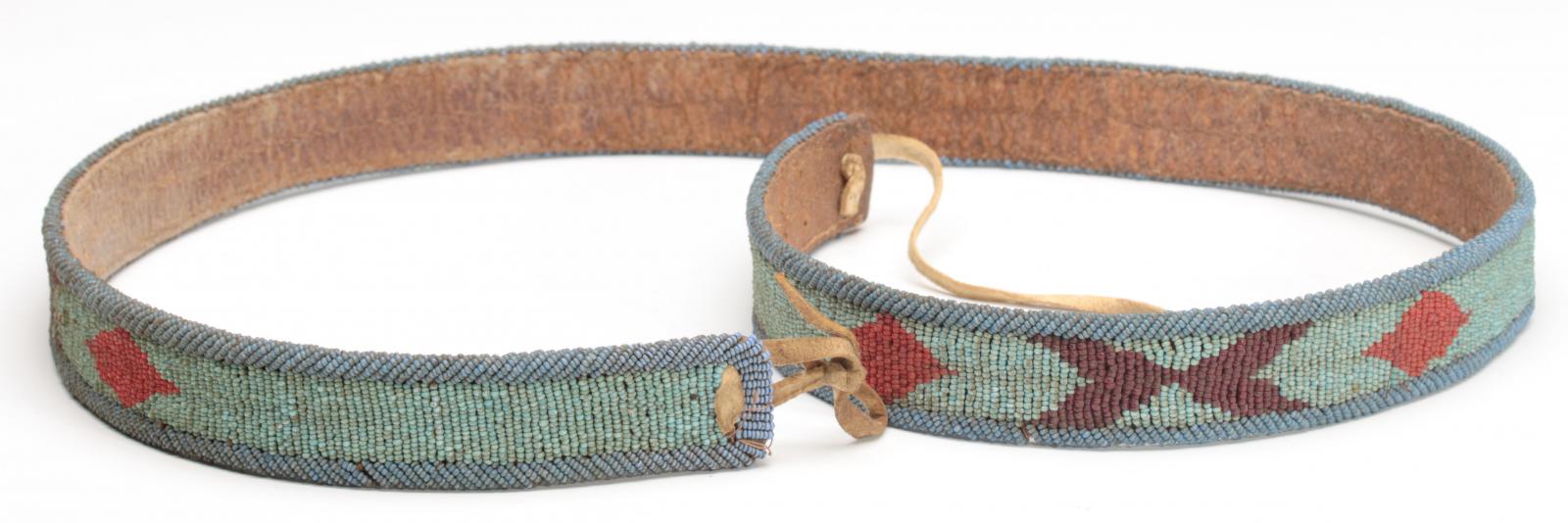 A NATIVE AMERICAN BEADED HIDE BELT