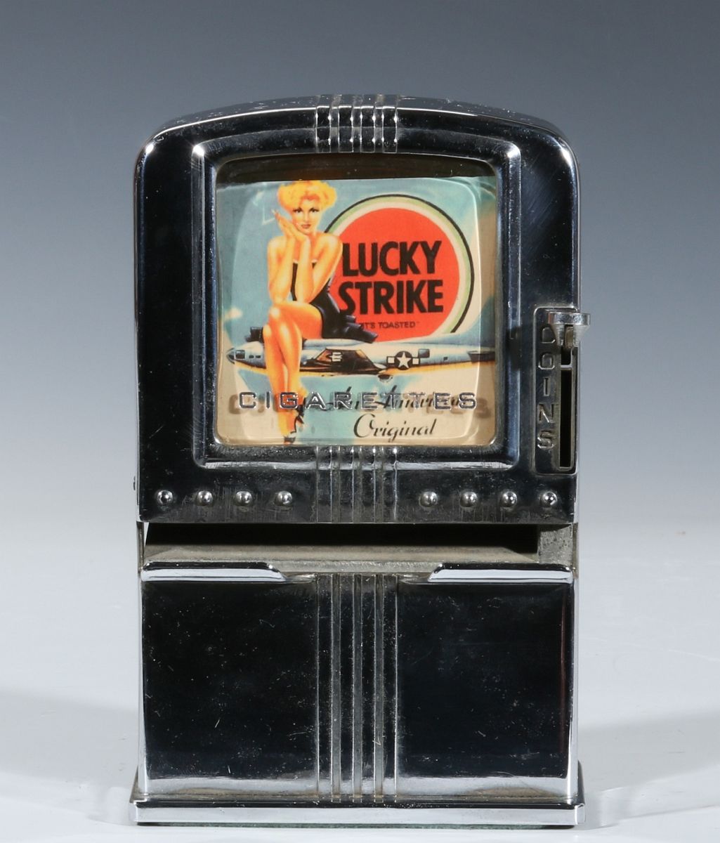 AN ART DECO TABLE-TOP CIGARETTE DISPENSER C. 1940