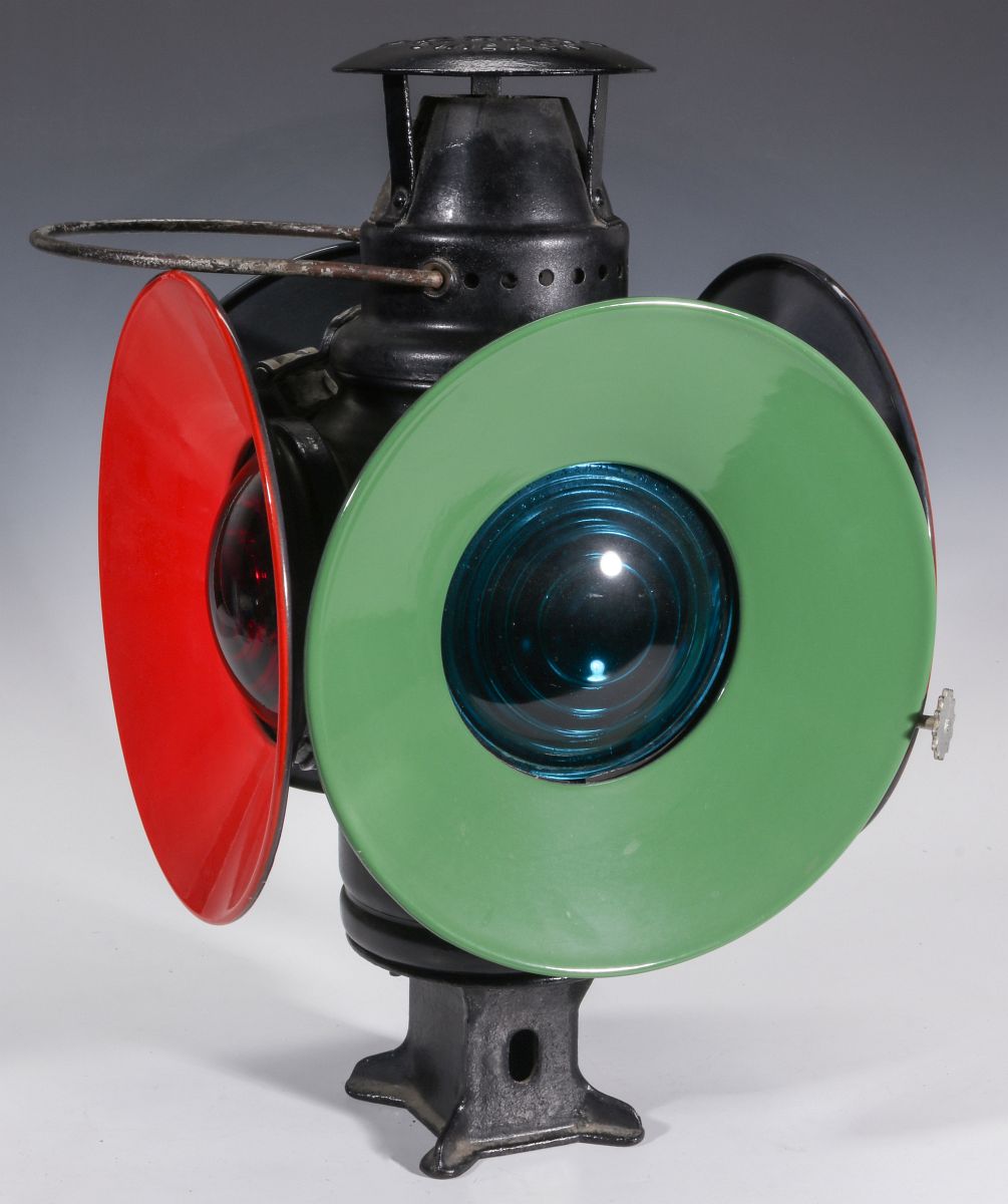 AN ADLAKE PRESSED STEEL SWITCH LAMP CIRCA 1906