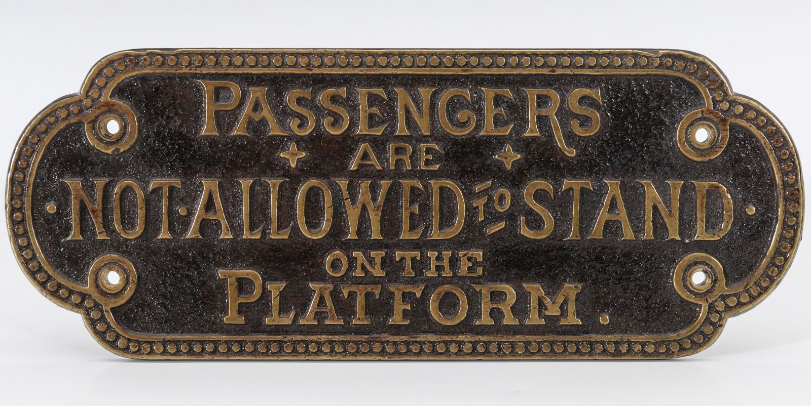 AN ADLAKE PASSENGER NOTICE PLATE NO. 13