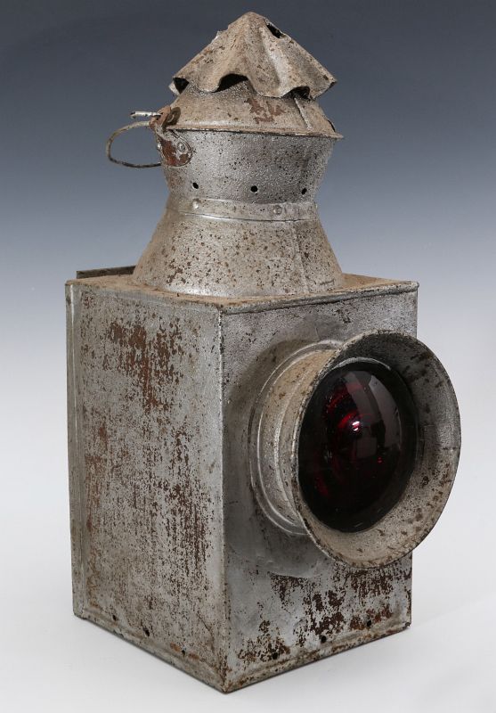 AN EARLY TIN OIL BURNING RAILROAD LANTERN