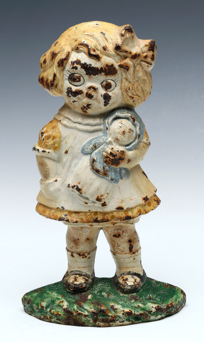 A HUBLEY DOLLY DINGLE DOORSTOP NO. 45, CIRCA 1920