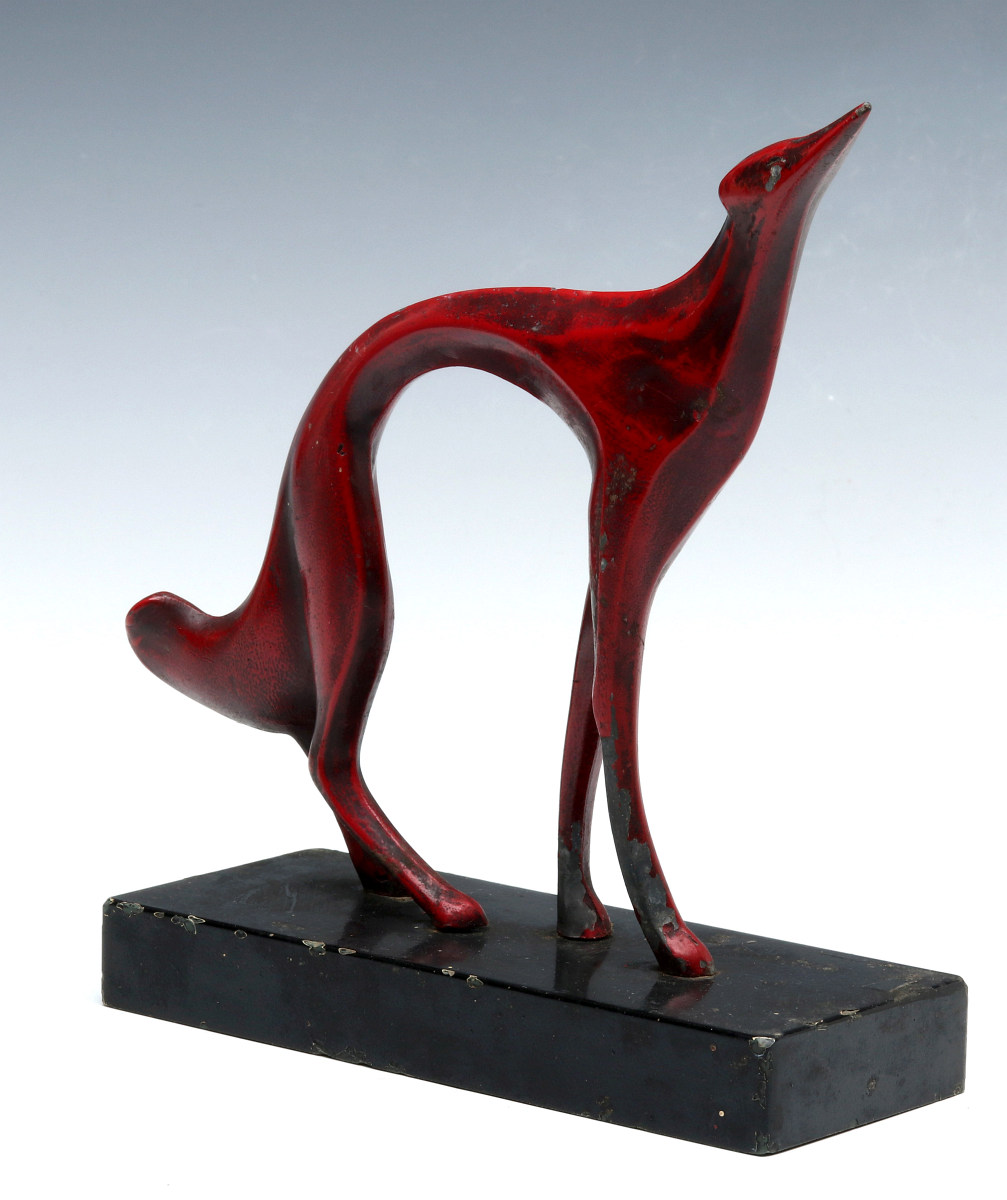 AN UNUSUAL ART DECO STYLIZED BORZOI DOG DOORSTOP