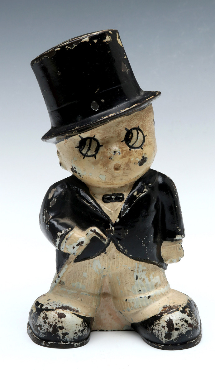 A JUDD CO. TUXEDO BOY CAST IRON DOORSTOP NO. 1262