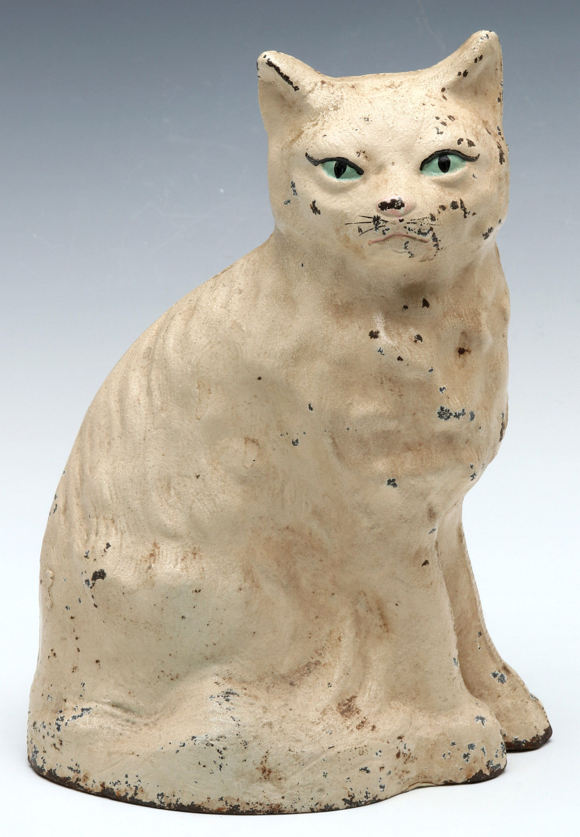 A CREATIONS CO. SITTING CAT DOORSTOP CIRCA 1930