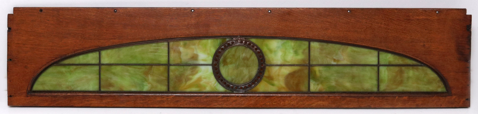 A STAINED AND LEADED RAILROAD PASSENGER CAR WINDOW