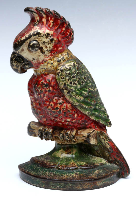 A CAST IRON PARROT DOORSTOP CIRCA 1920s