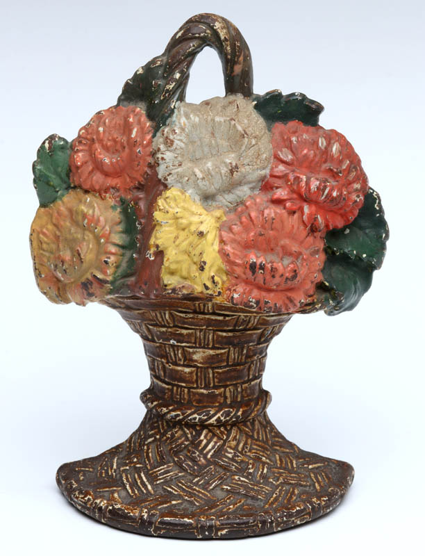 A WAVERLY STUDIOS FLOWER BASKET DOORSTOP C. 1926