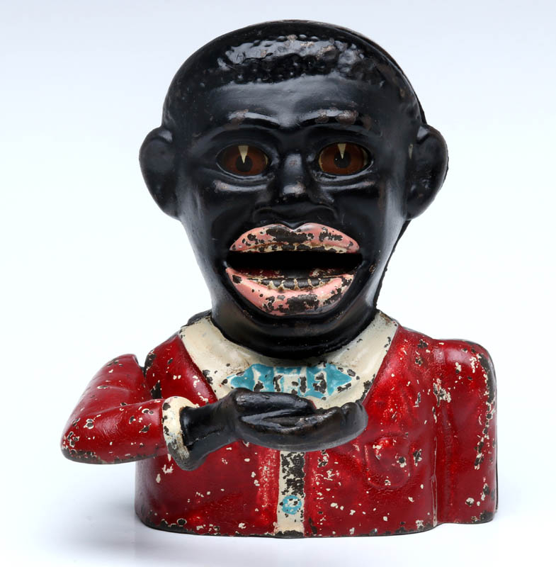 AN AFRICAN AMERICAN MAN MECHANICAL BANK CIRCA 1900