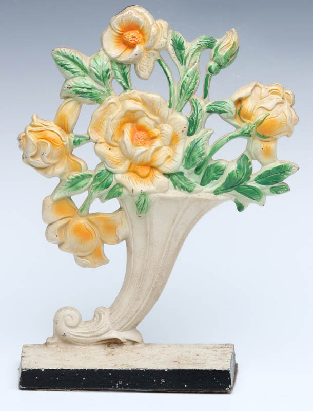 A HUBLEY ROSE VASE DOORSTOP NO. 441