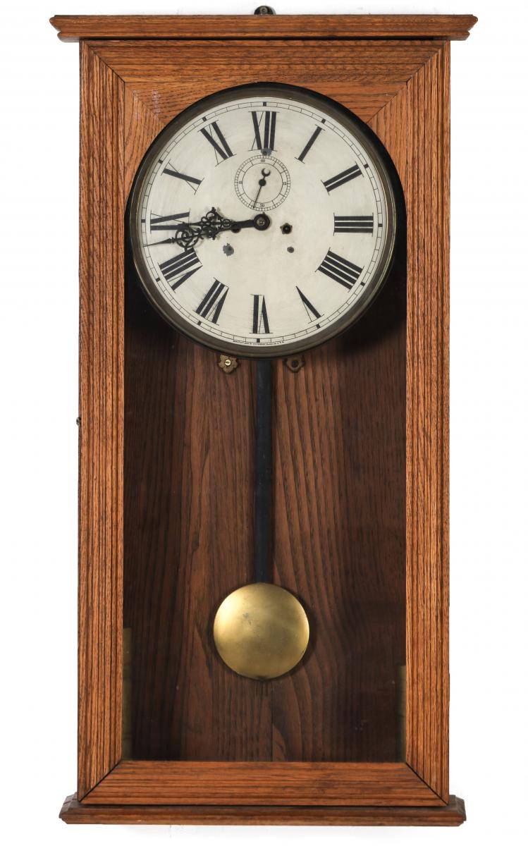 A WATERBURY EIGHT-DAY WALL CLOCK