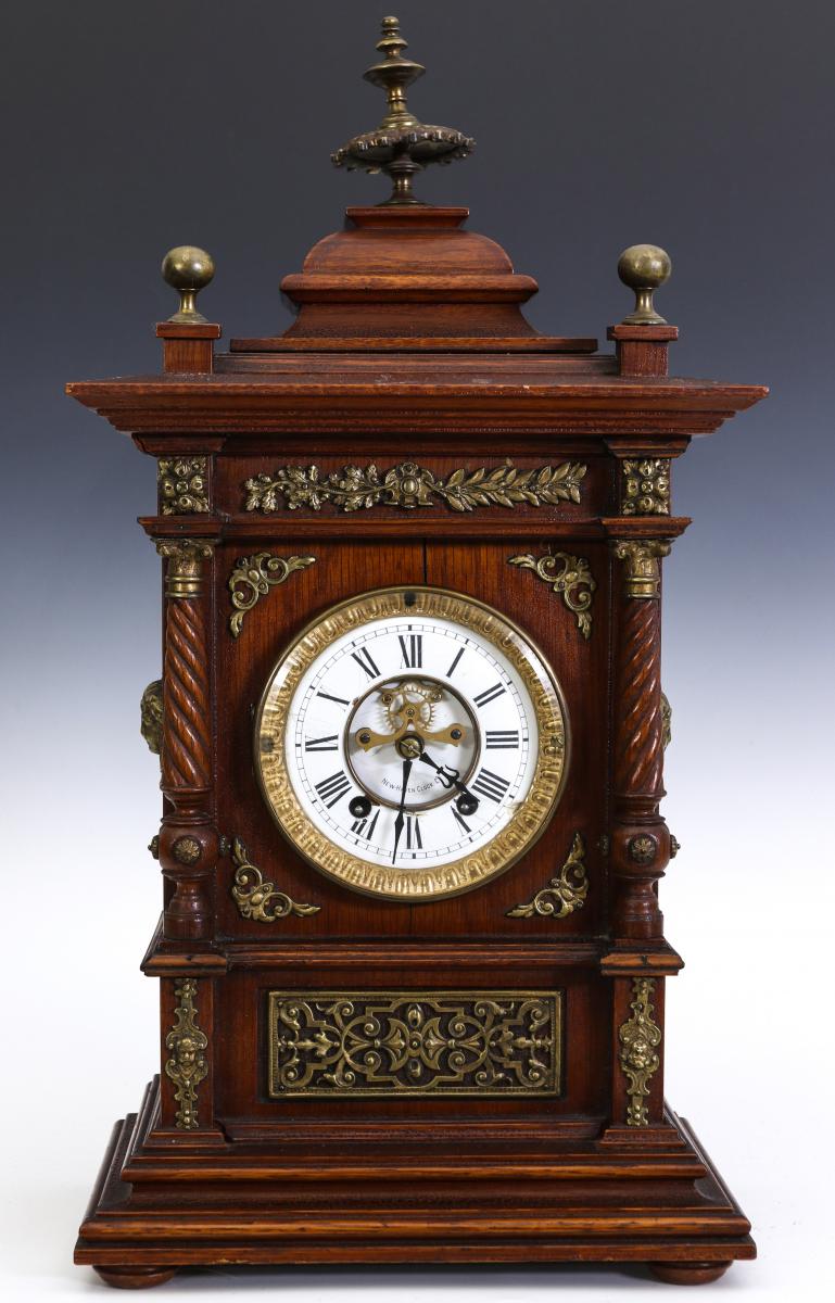 A GOOD NEW HAVEN CABINET MODEL SHELF CLOCK