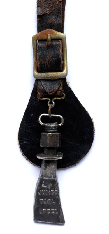 A RARE AVERY THRESHER TOOTH ADVERTISING WATCH FOB