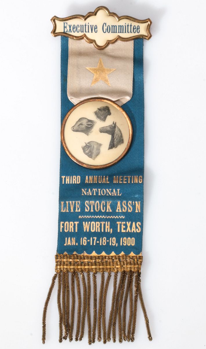 A NAT'L LIVE STOCK ASSN. RIBBON W/ CELLULOID BADGE