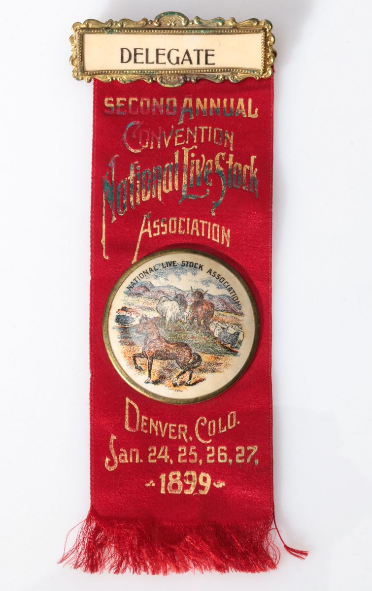 NAT'L LIVE STOCK ASSN. CELLULOID RIBBON BADGE 1899