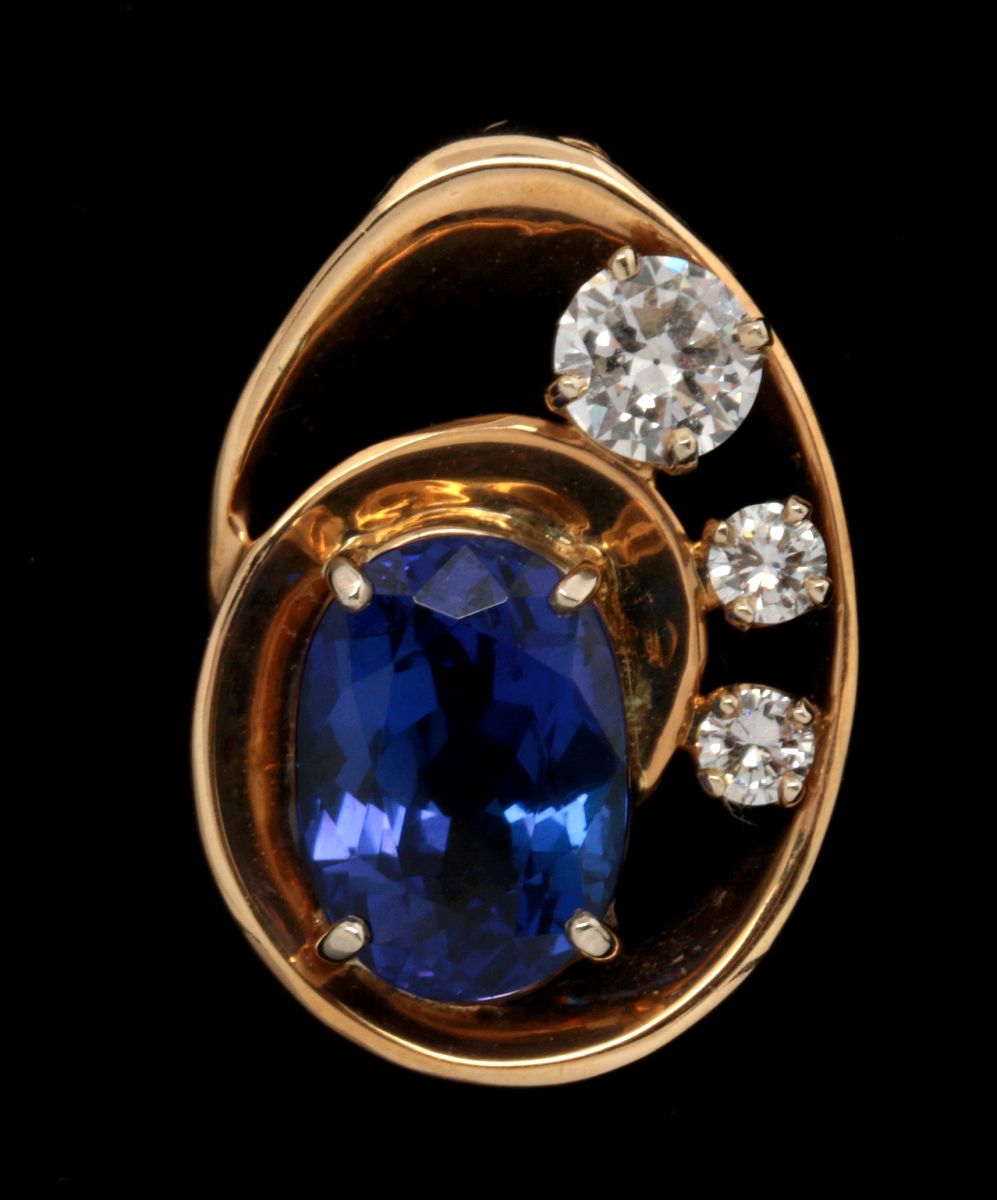 A 14K GOLD, DIAMOND, 4.87 CARAT TANZANITE PENDANT