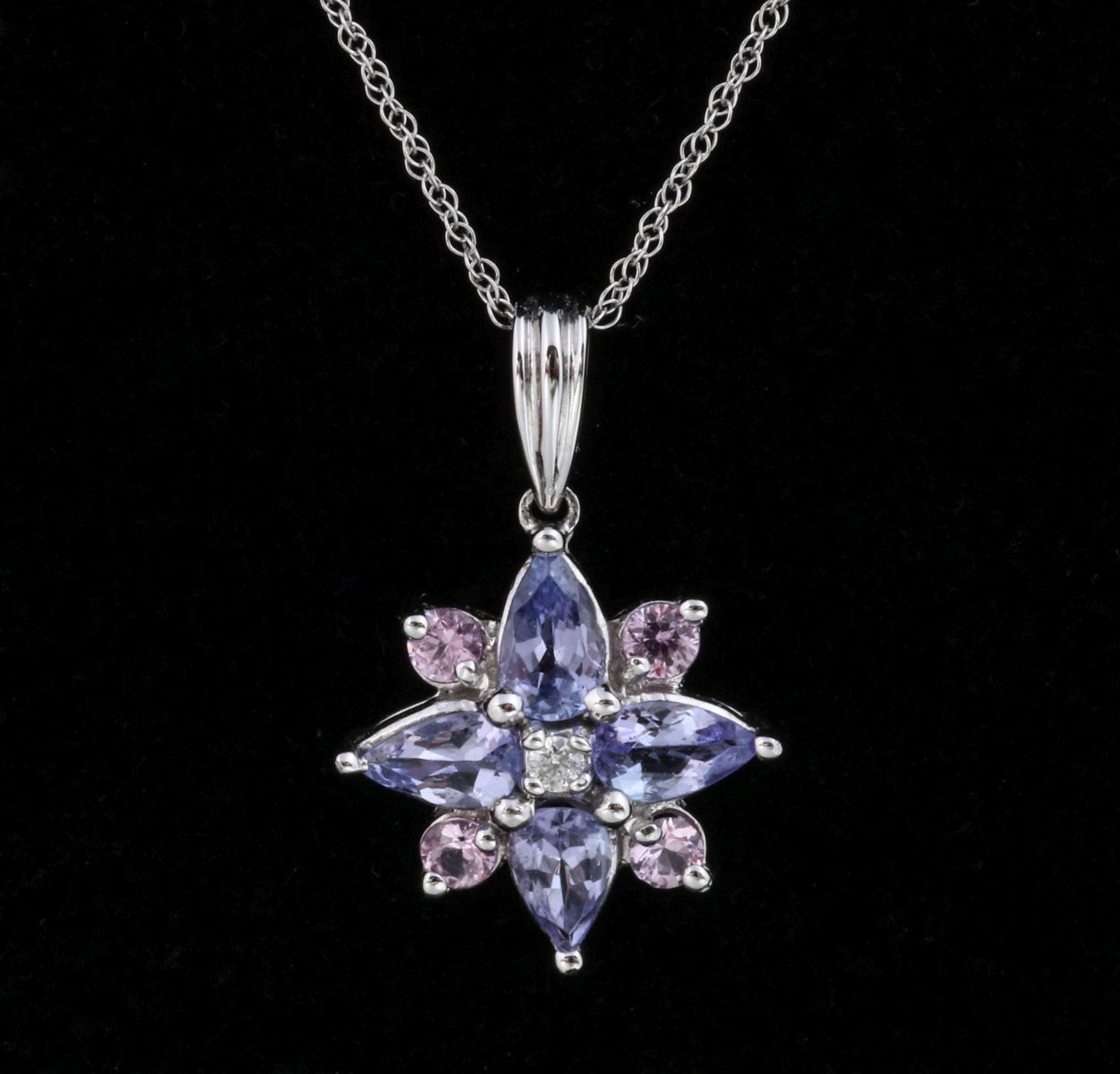 A 14K WHITE GOLD PENDANT WITH COLORED GEMSTONES