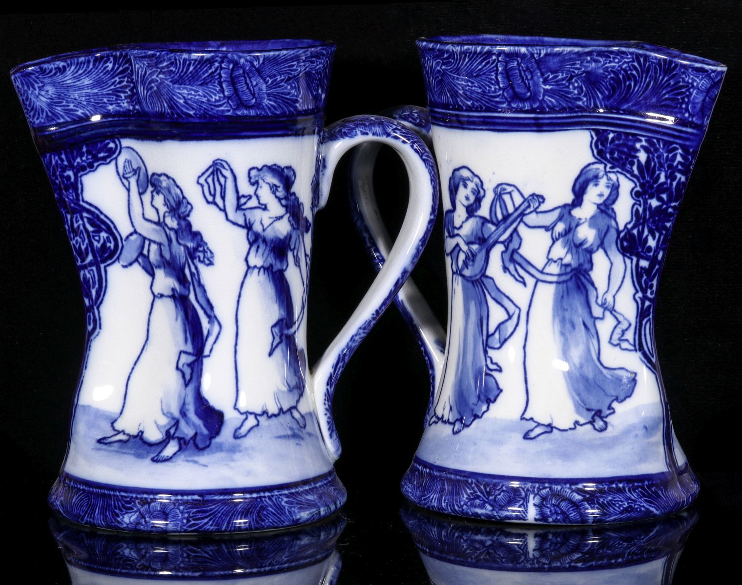 PAIR OF ROYAL DOULTON MORRISIAN FLOW BLUE PITCHERS