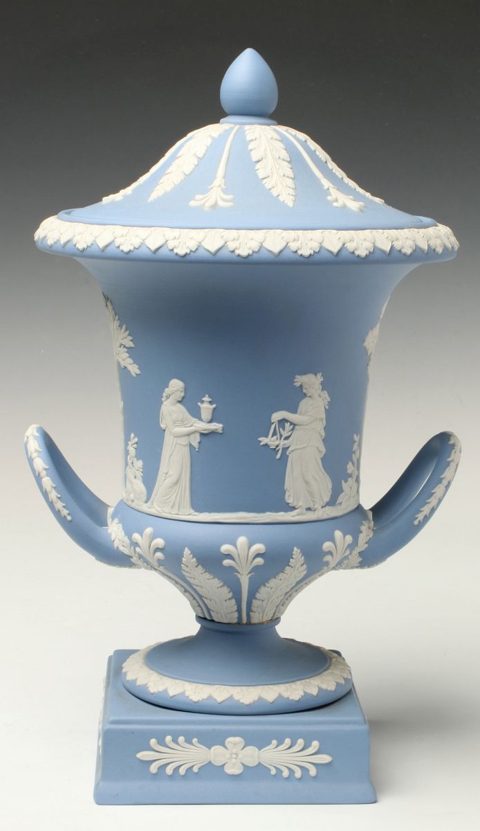 A WEDGWOOD BLUE JASPERWARE BOLTED COVERED URN