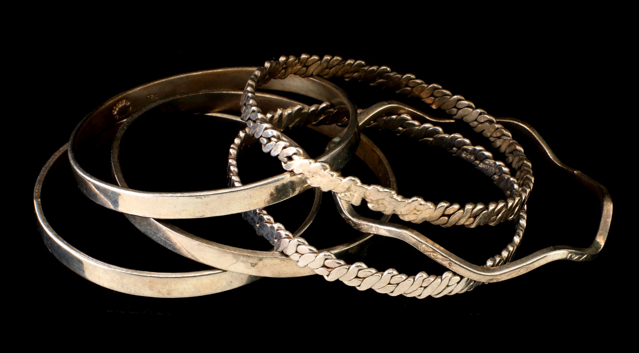 A COLLECTION OF STERLING SILVER BANGLE BRACELETS