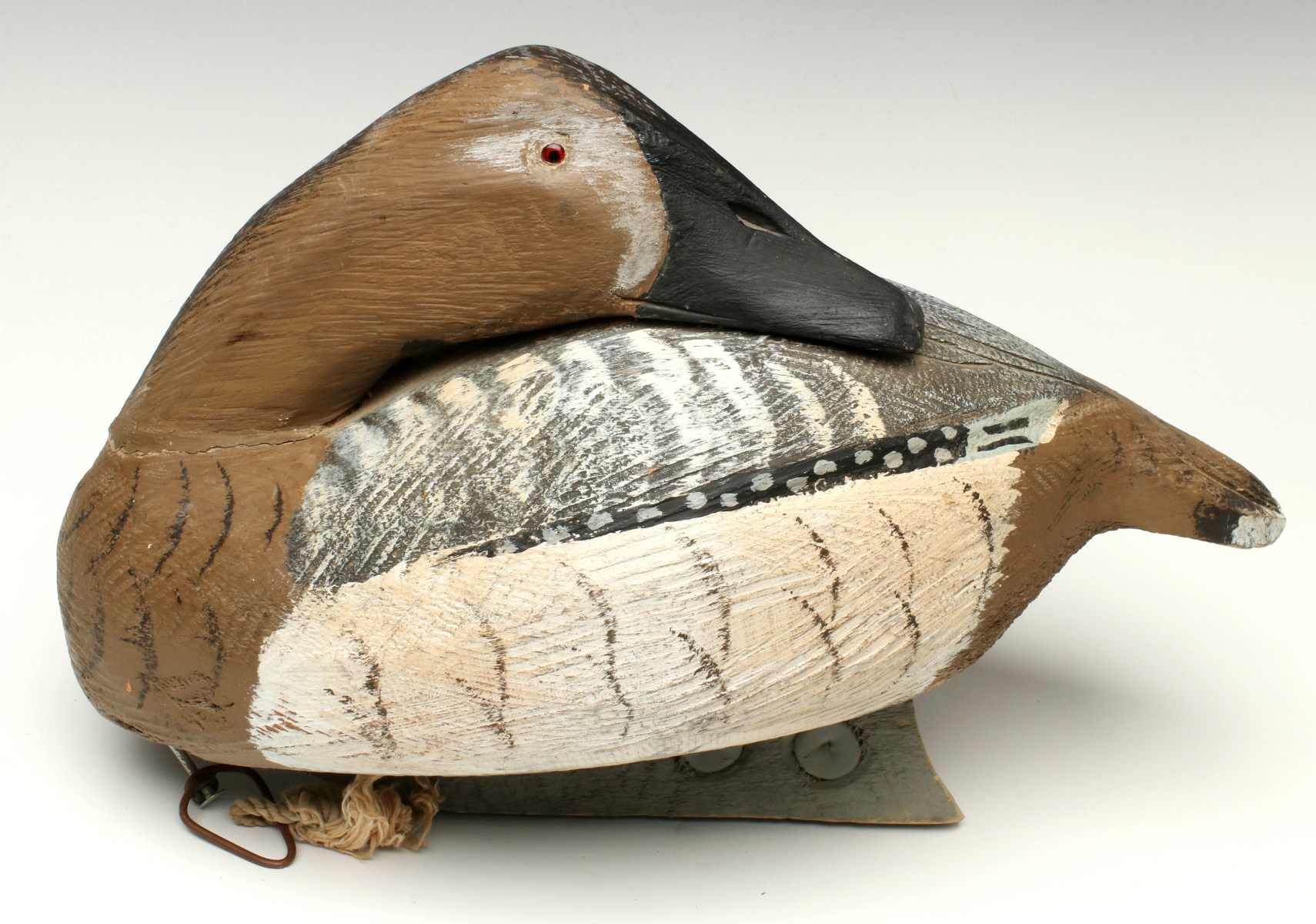 A TOM MARTINDALE PREENING CANVAS BACK HEN DECOY