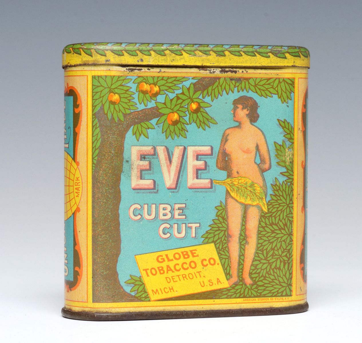 AN 'EVE' BRAND GLOBE TOBACCO CO. POCKET TIN