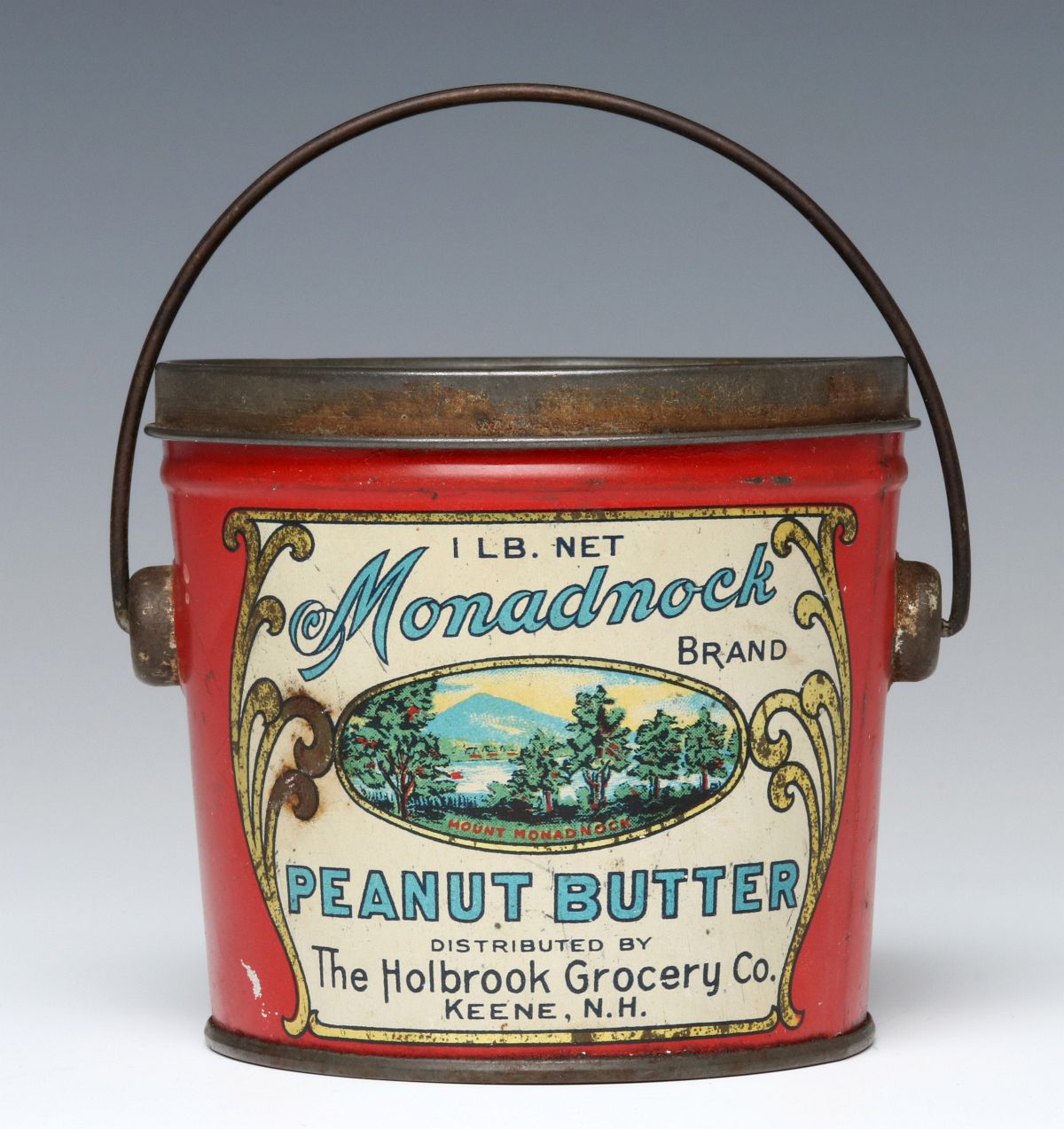 A MONADNOCK TIN LITHOGRAPH PEANUT BUTTER PAIL