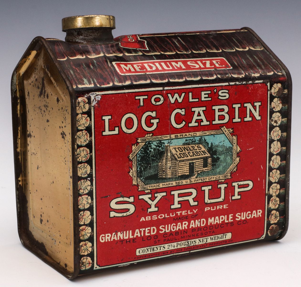 A 'MEDIUM SIZE' LOG CABIN SYRUP ADVERTISING TIN