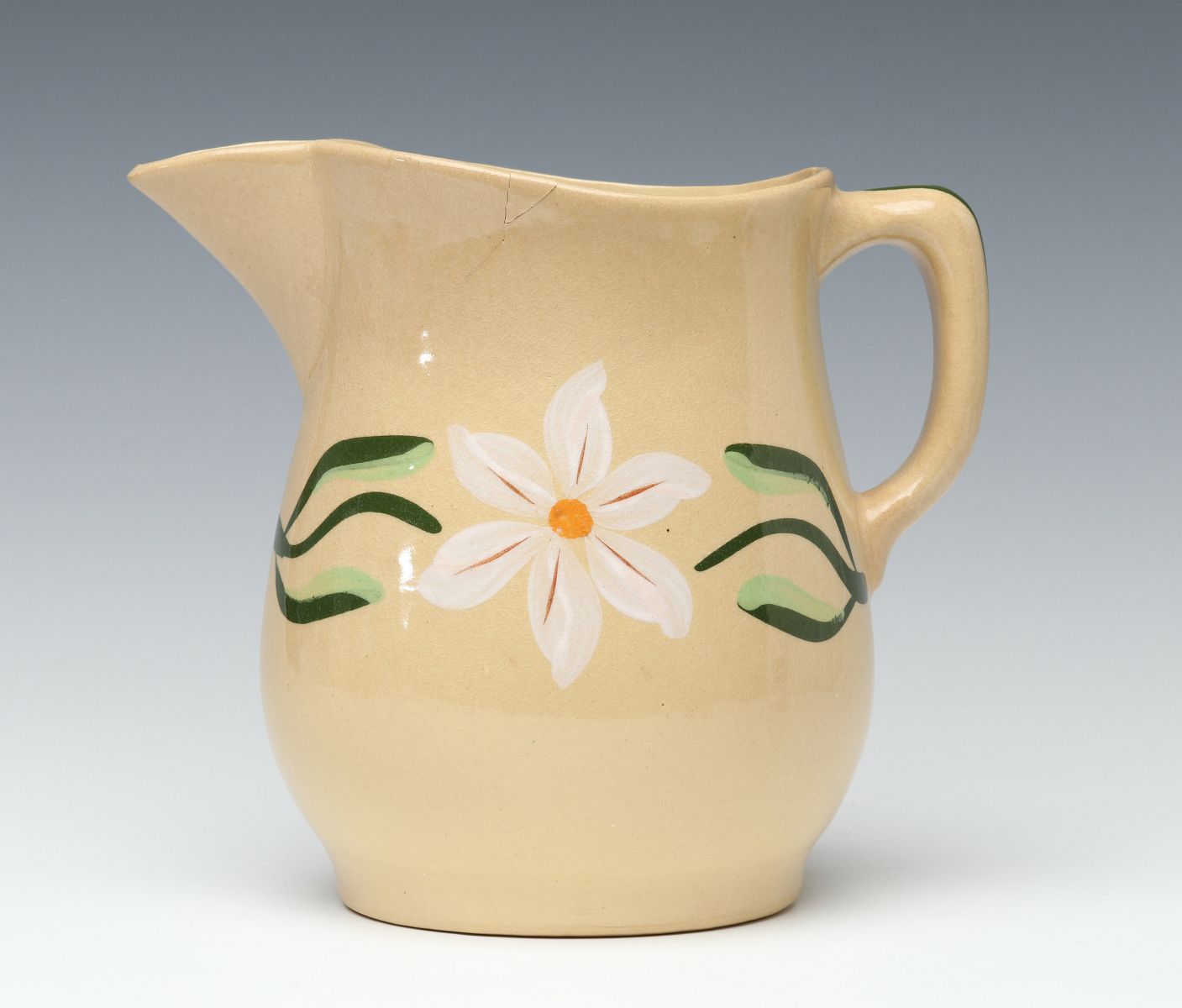 A RARE WHITE DAISY PATTERN WATT POTTERY PITCHER