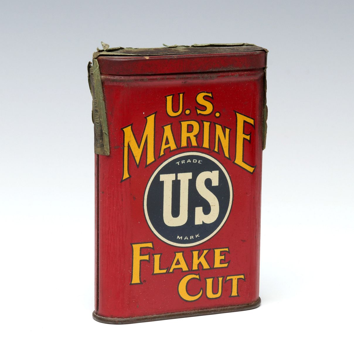 A US MARINE BRAND FLAKE CUT POCKET TOBACCO TIN