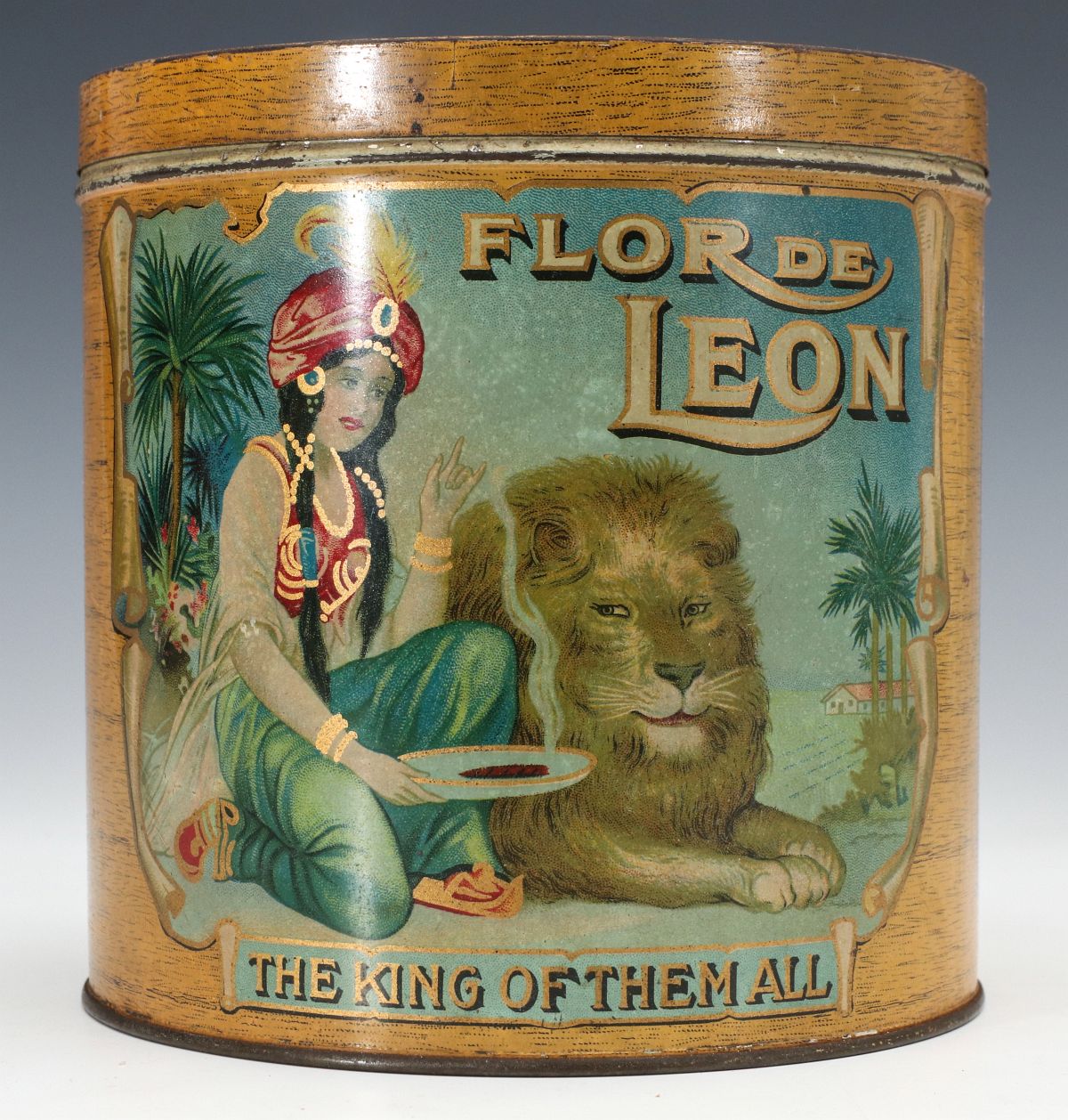 A TIN LITHOGRAPH CONTAINER FOR FLOR DE LEON CIGARS