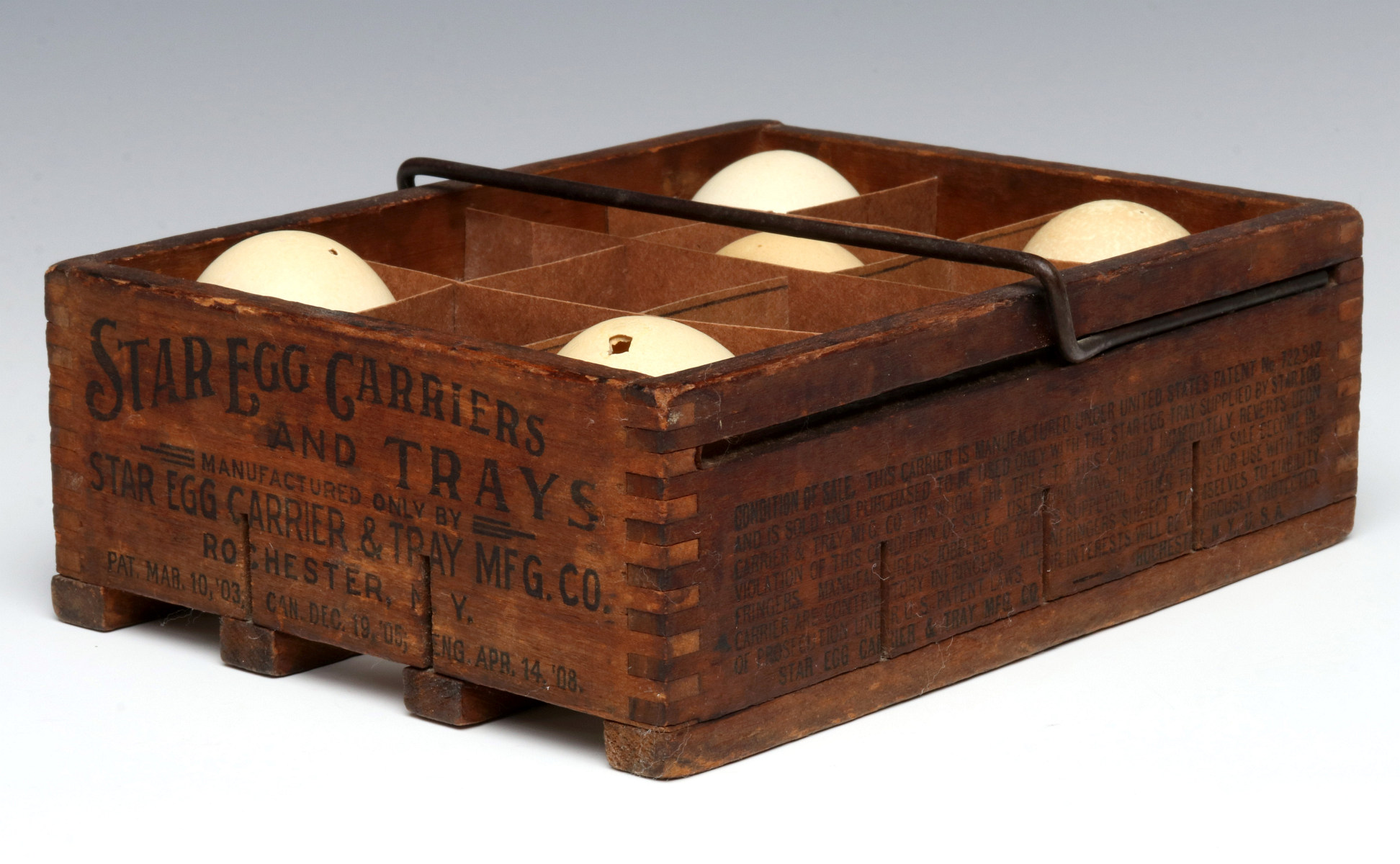 A CIRCA 1908 STAR EGG CARRIER FOR ONE DOZEN EGGS