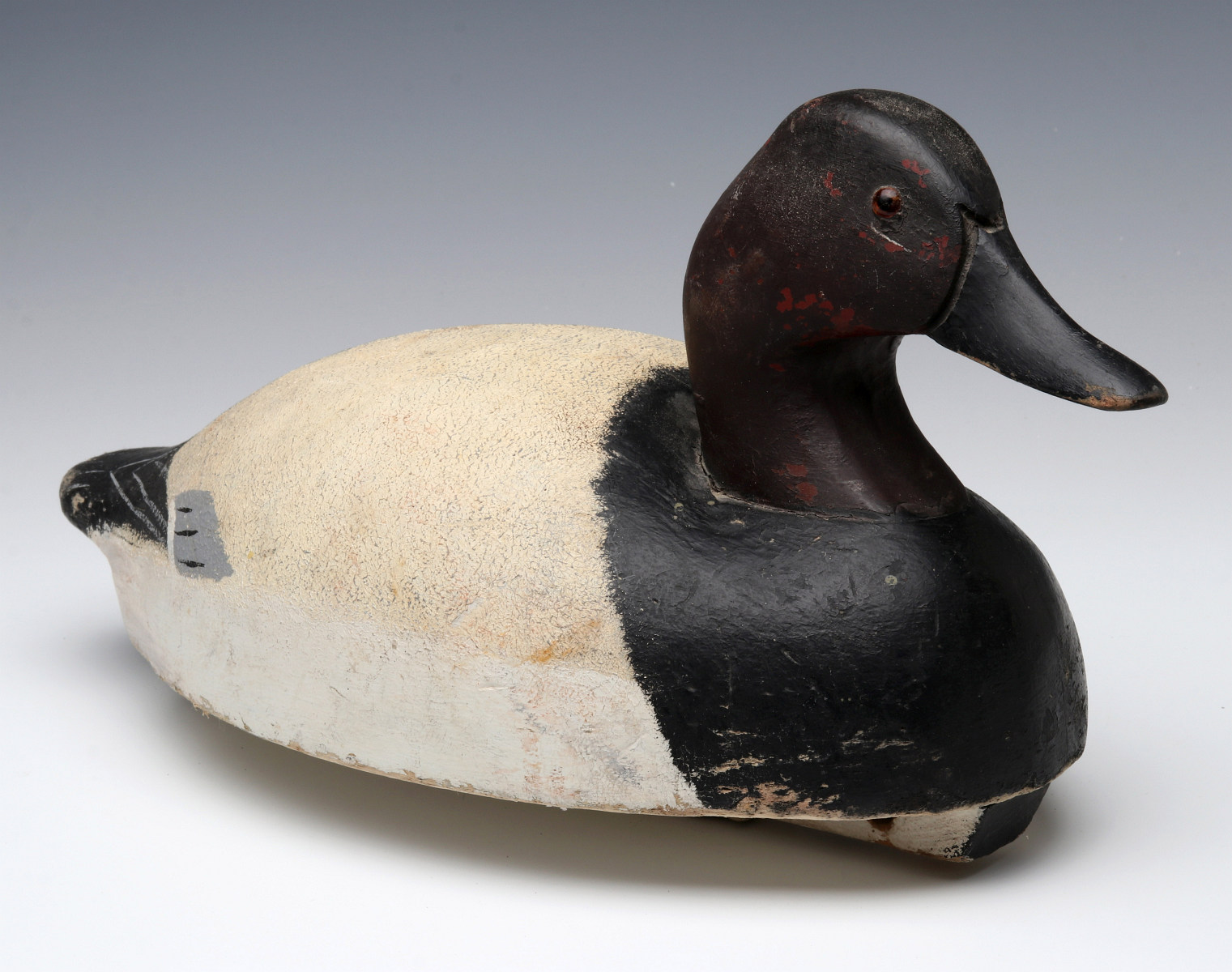 A CANVASBACK DRAKE DECOY