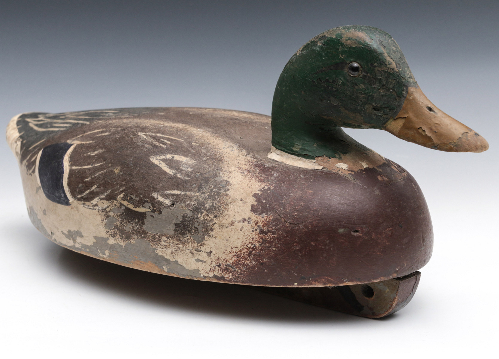 AN EARLY 20TH C MALLARD DRAKE FACTORY WOODEN DECOY