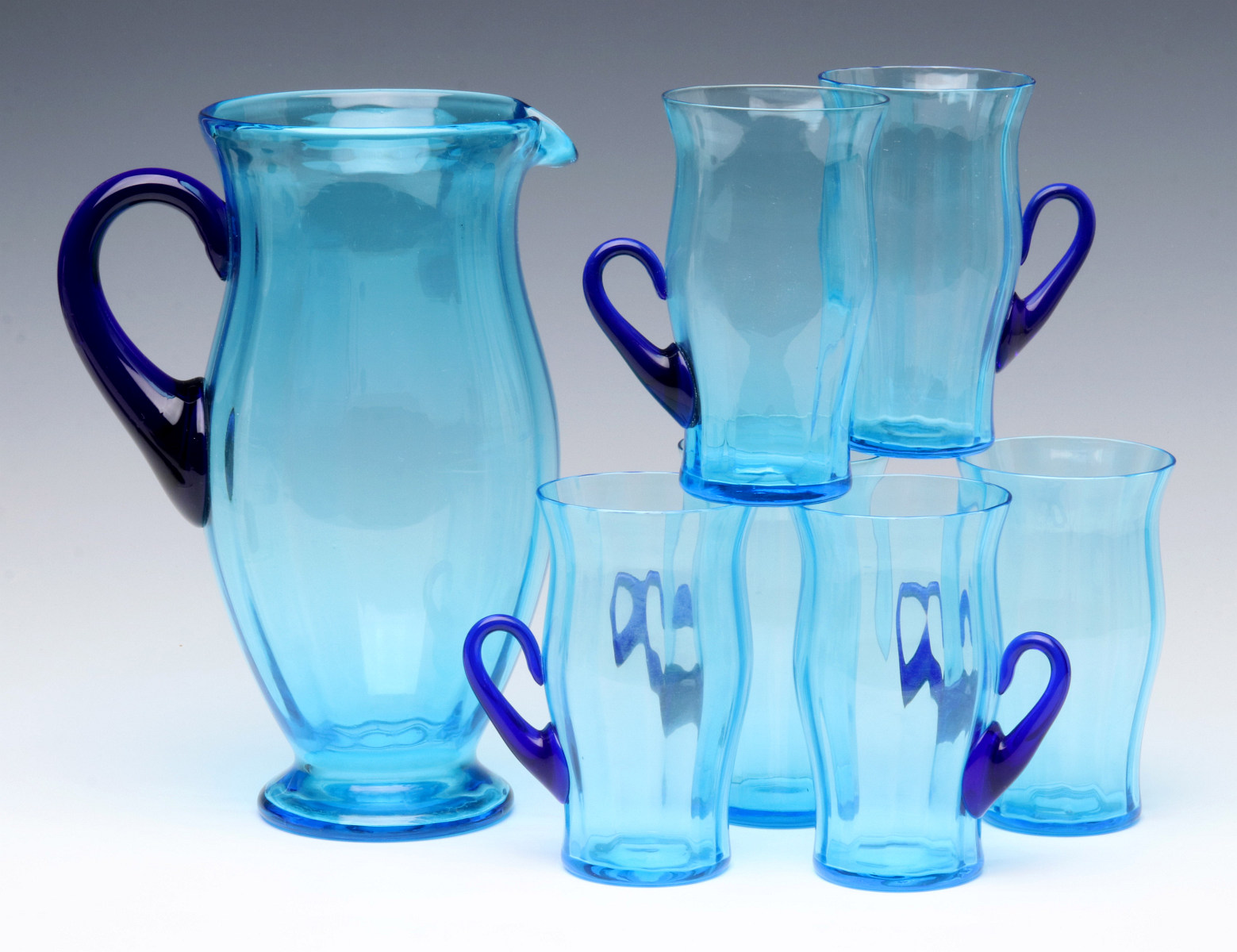 A FENTON CELESTE BLUE PITCHER AND TUMBLERS SET